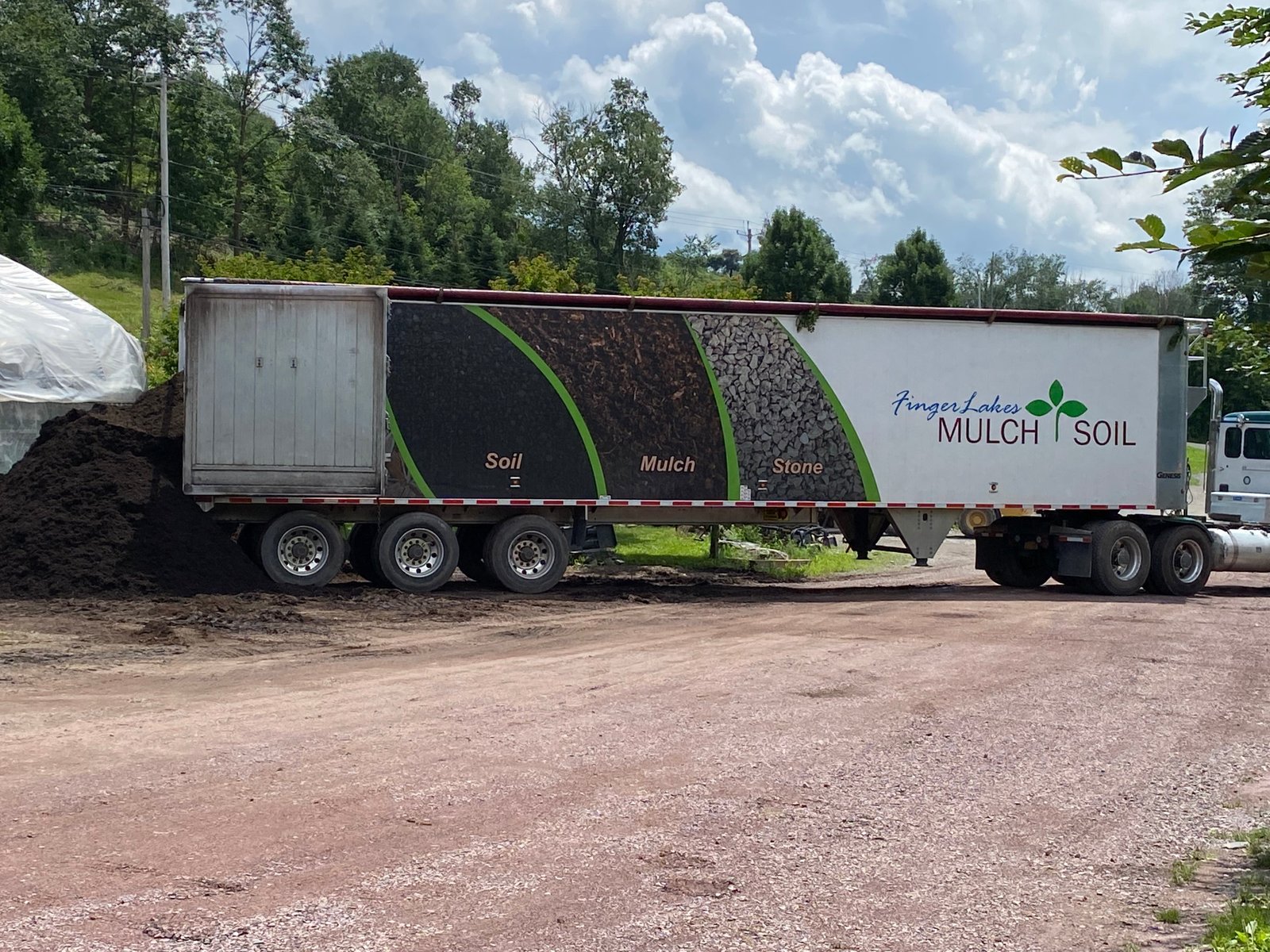 Reusable containers and bulk garden materials used to reduce packaging waste