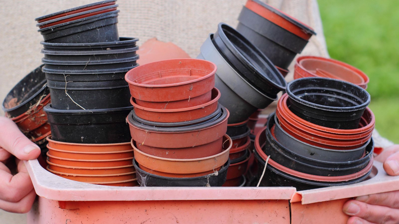 Reusable pots and durable gardening tools used to reduce plastic waste in the garden